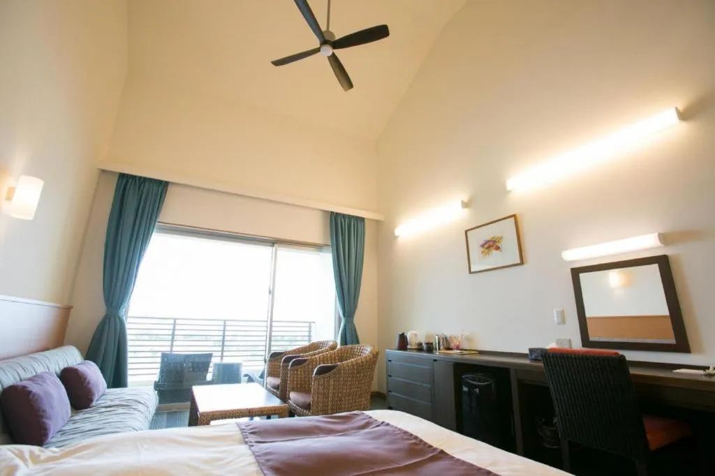 Bed in Sakura Resort Hotel Ishigaki