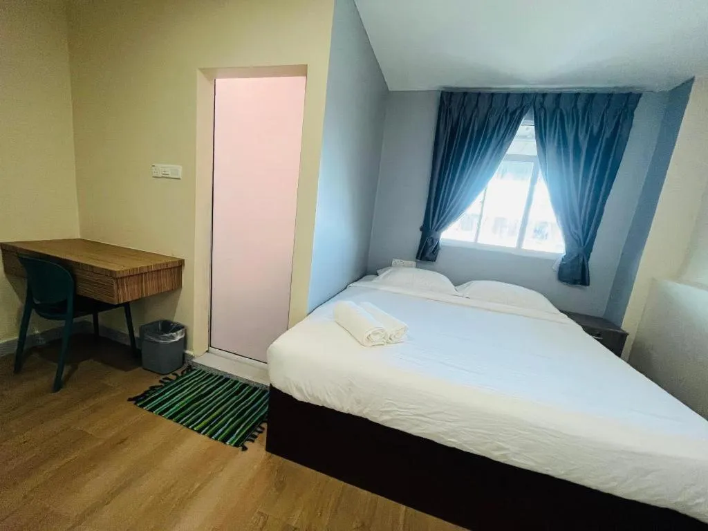 Bed in SemRock Hotel