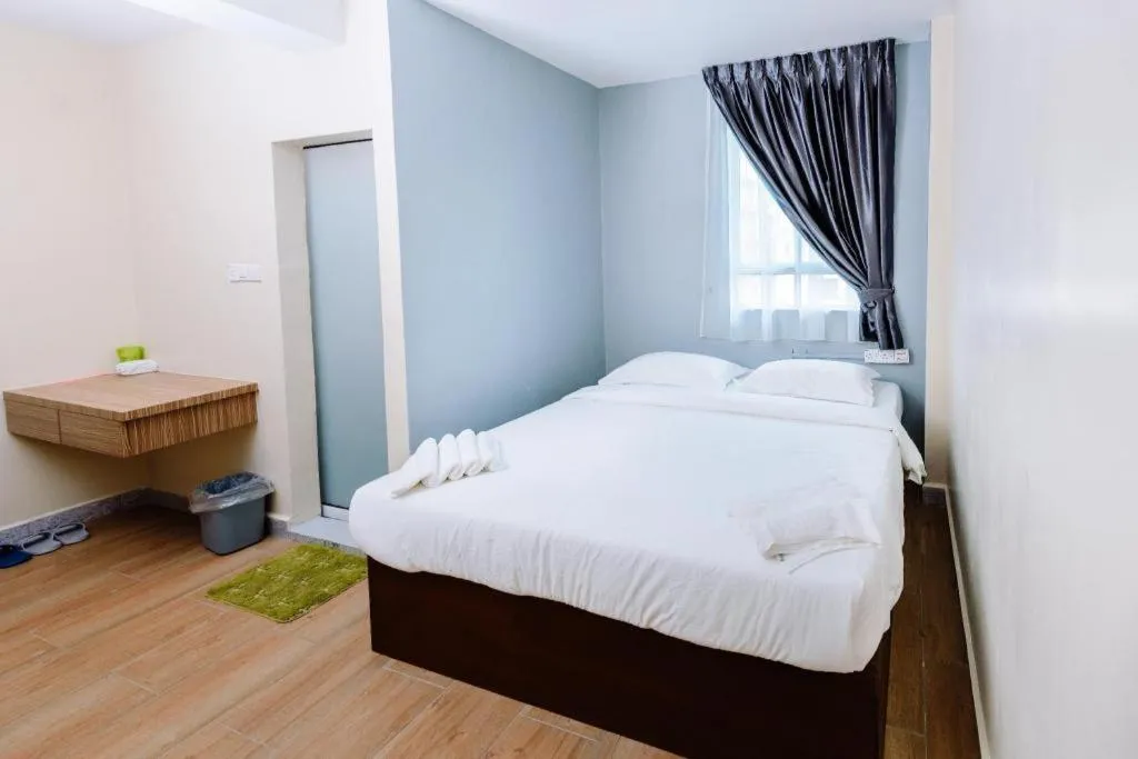 Bed in SemRock Hotel