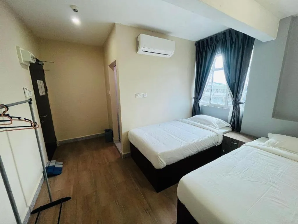 Bed in SemRock Hotel