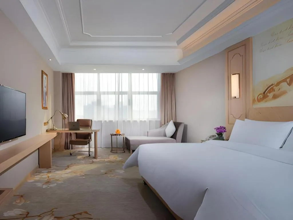 Bed in Vienna International Hotel Wuxi Taihu Expo Center