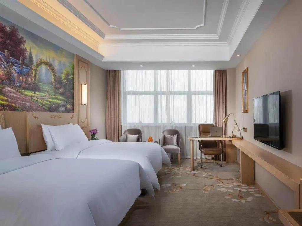 Bed in Vienna International Hotel Wuxi Taihu Expo Center