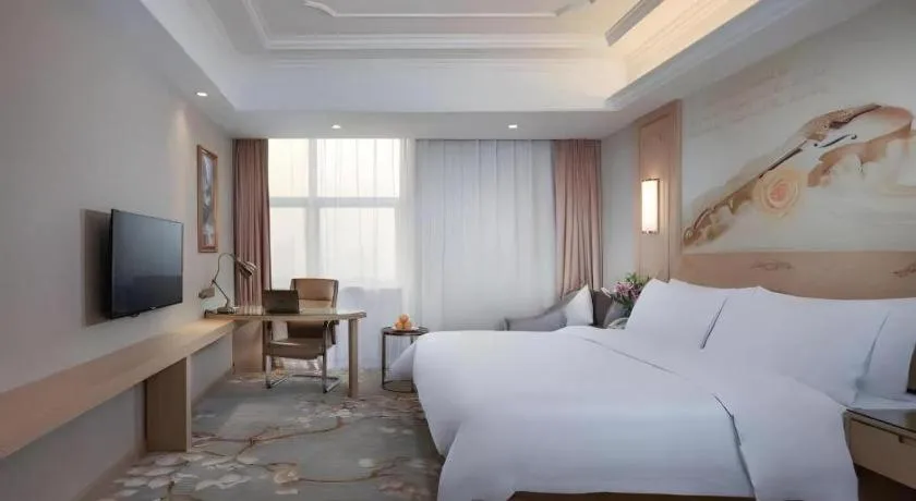 Bed in Vienna International Hotel Wuxi Taihu Expo Center