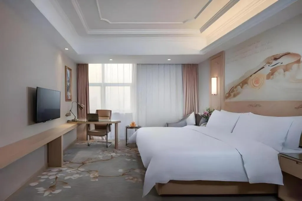 Bed in Vienna International Hotel Wuxi Taihu Expo Center