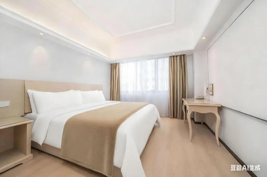 Bed in Vienna Hotel Shenzhen Pinghu Shuangyong Street Metro Station