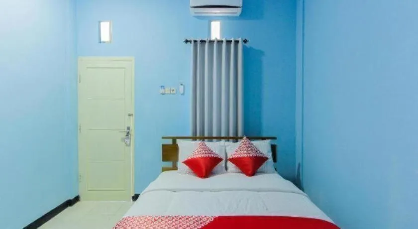 Bed in Hotel O Asipra House