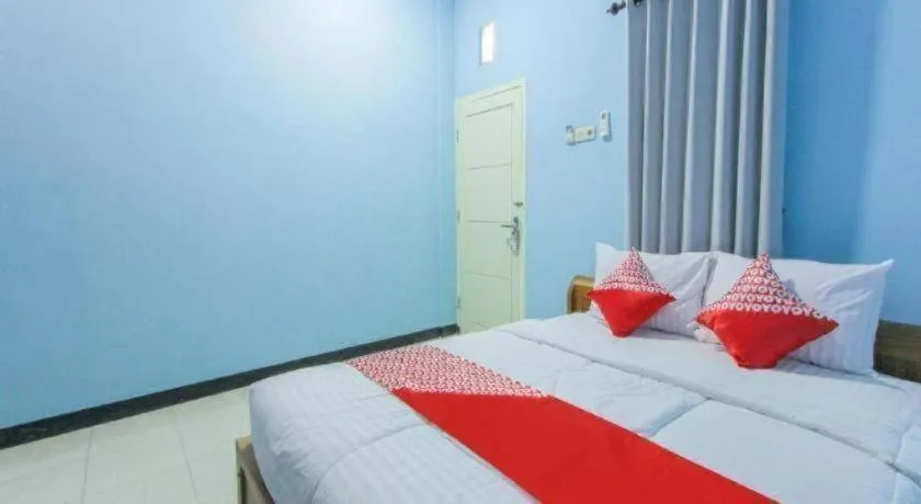 Bed in Hotel O Asipra House