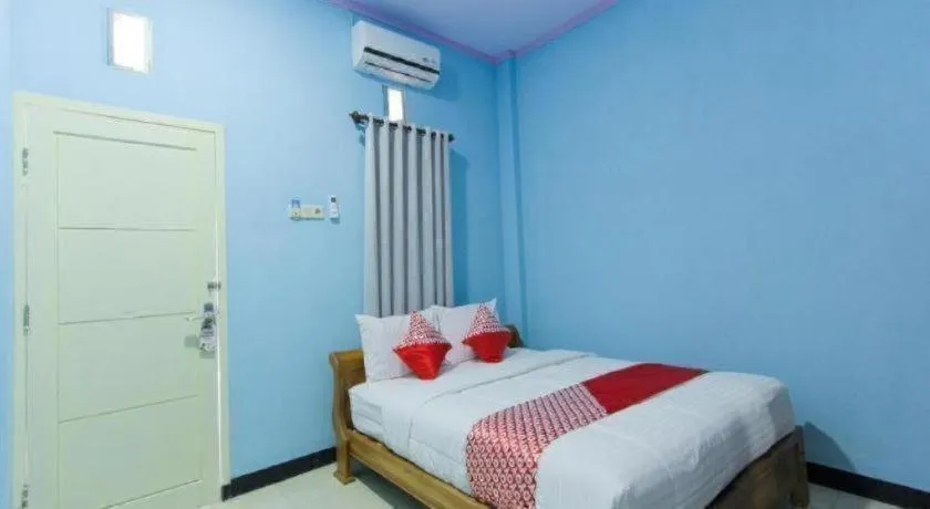 Bed in Hotel O Asipra House