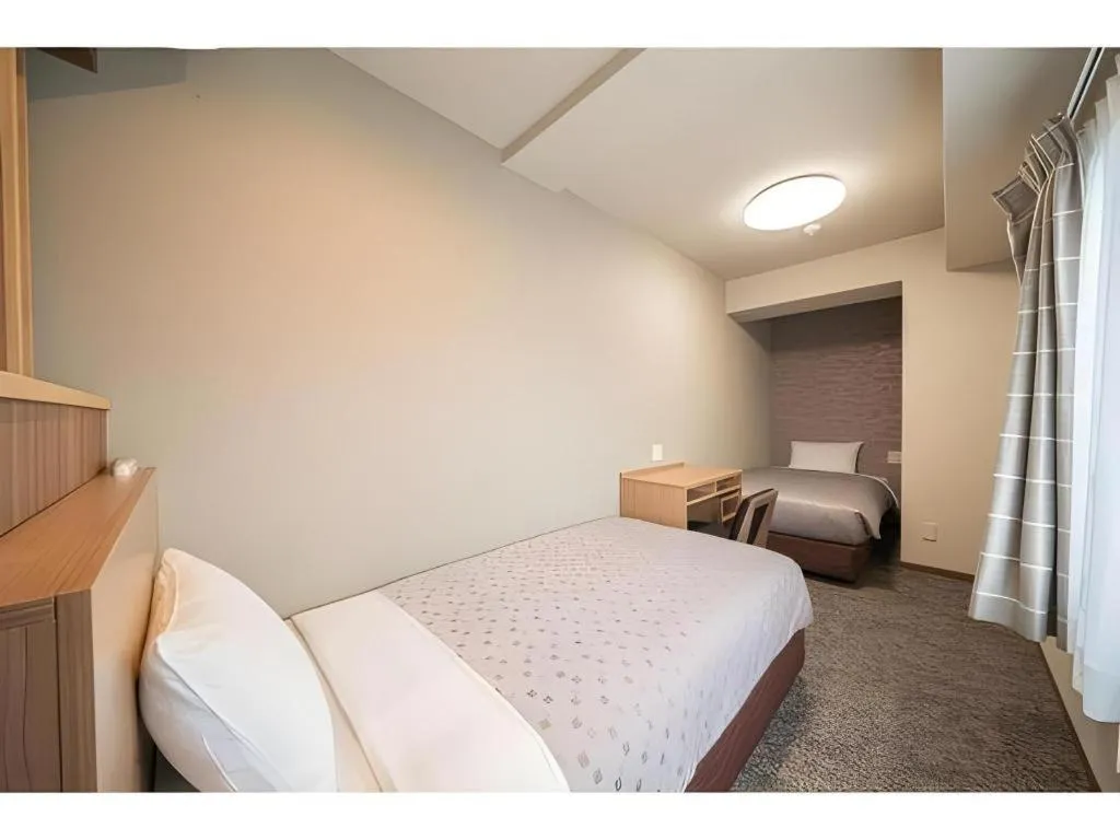 Bed in Kyoto Plaza Hotel Kyoto Station South