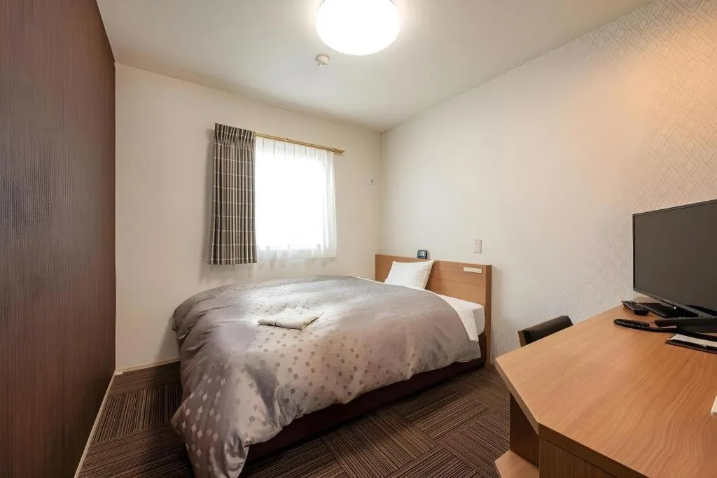 Bed in Kyoto Plaza Hotel Kyoto Station South