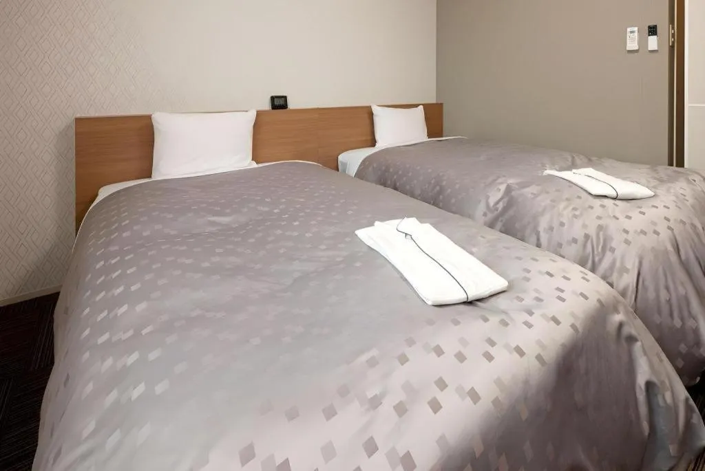 Bed in Kyoto Plaza Hotel Kyoto Station South