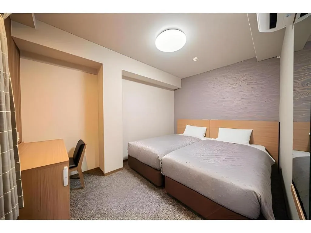 Bed in Kyoto Plaza Hotel Kyoto Station South