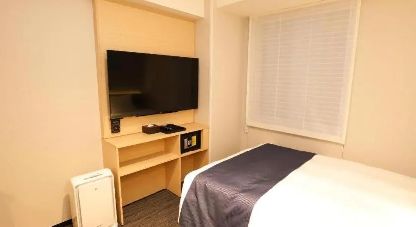 Bed in KEIKYU EX INN Haneda Innovation City 2 minutes walk from HICity Exit of Tenkubashi Station
