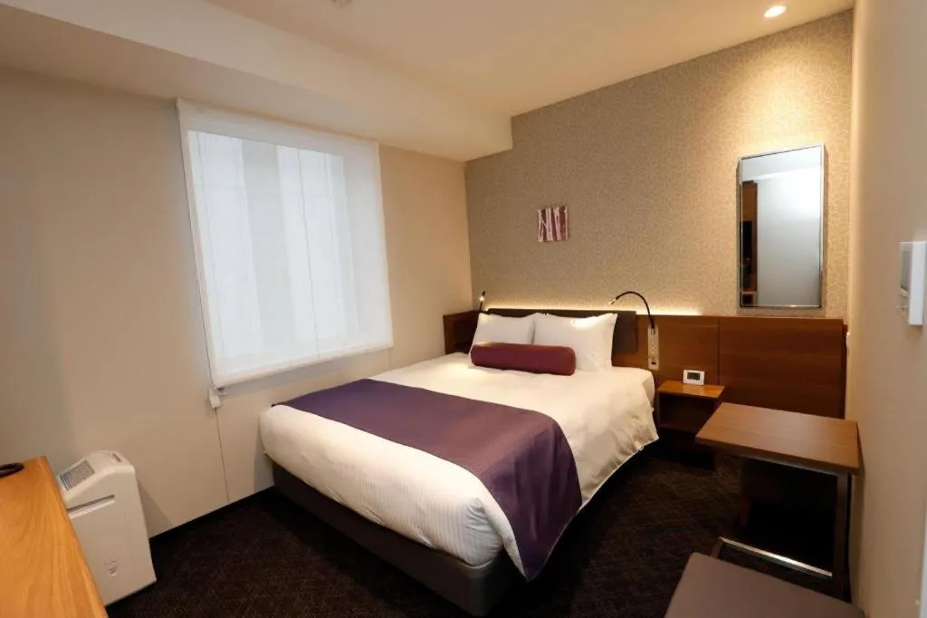 Bed in KEIKYU EX INN Haneda Innovation City 2 minutes walk from HICity Exit of Tenkubashi Station