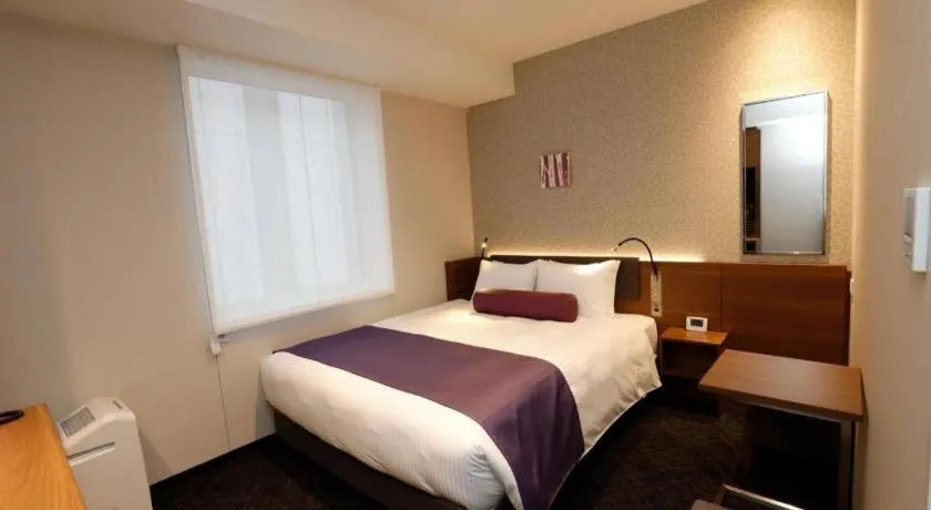 Bed in KEIKYU EX INN Haneda Innovation City 2 minutes walk from HICity Exit of Tenkubashi Station