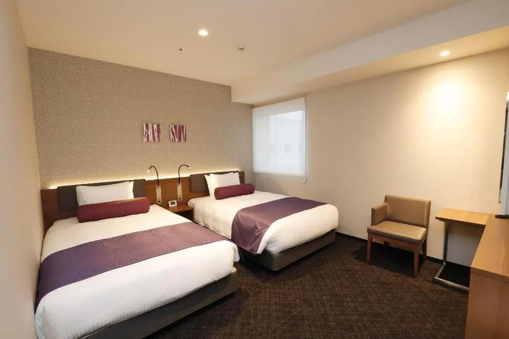 Bed in KEIKYU EX INN Haneda Innovation City 2 minutes walk from HICity Exit of Tenkubashi Station