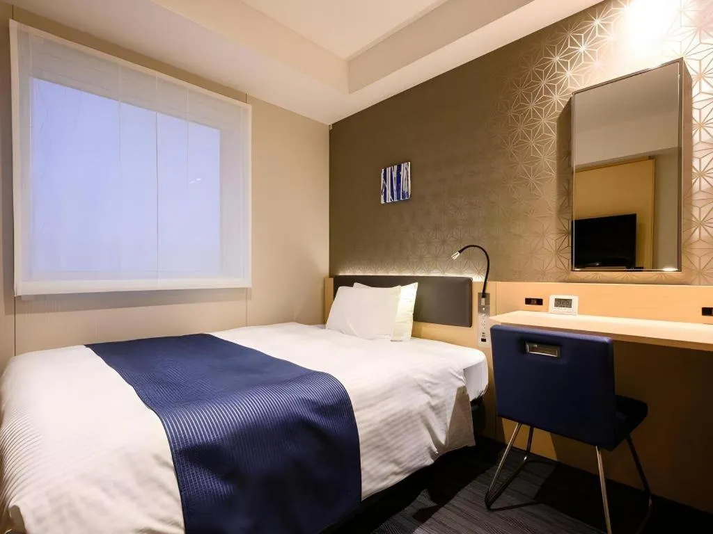 Bed in KEIKYU EX INN Haneda Innovation City 2 minutes walk from HICity Exit of Tenkubashi Station