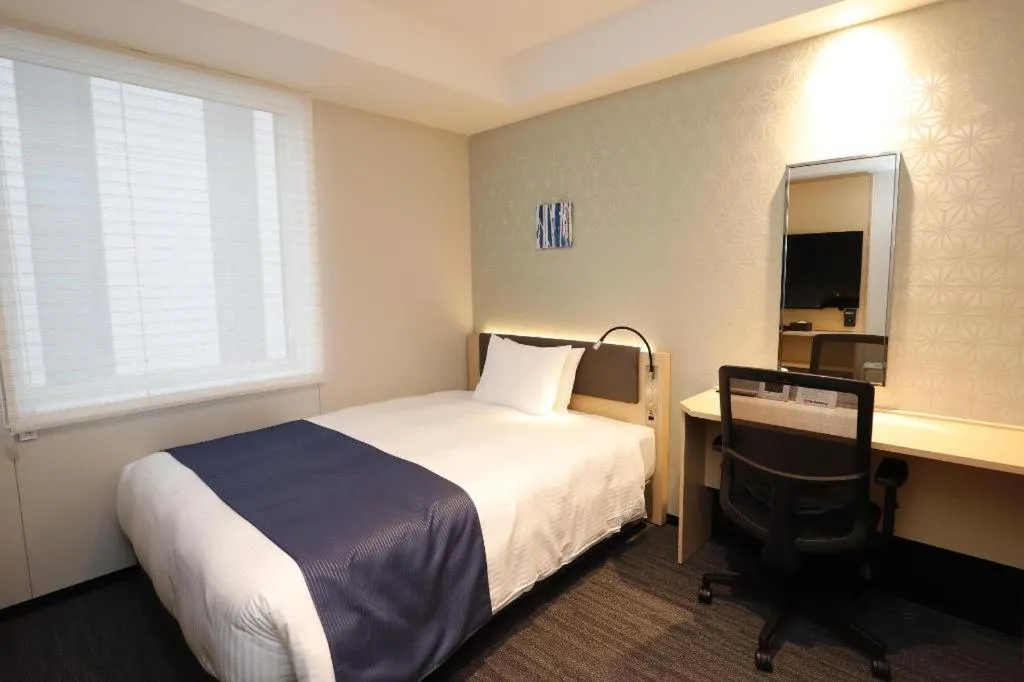 Bed in KEIKYU EX INN Haneda Innovation City 2 minutes walk from HICity Exit of Tenkubashi Station