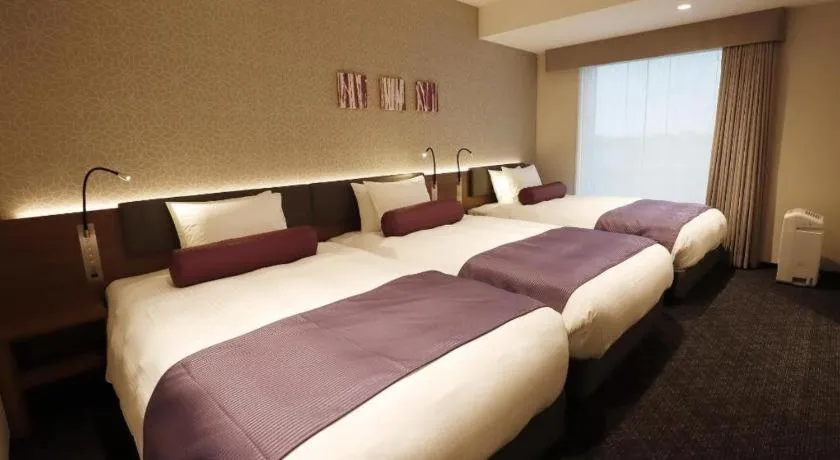 Bed in KEIKYU EX INN Haneda Innovation City 2 minutes walk from HICity Exit of Tenkubashi Station