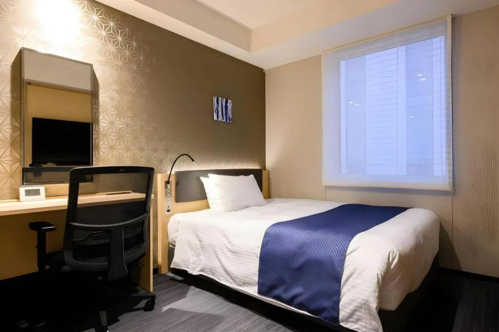 Bed in KEIKYU EX INN Haneda Innovation City 2 minutes walk from HICity Exit of Tenkubashi Station