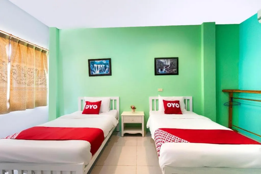 Bed in Thanagrit Apartelle