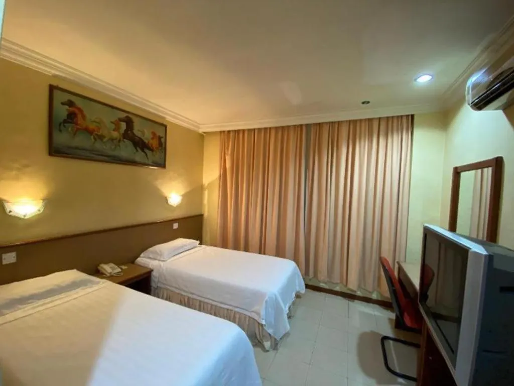 Bed in OYO 89958 Hotel Umimas