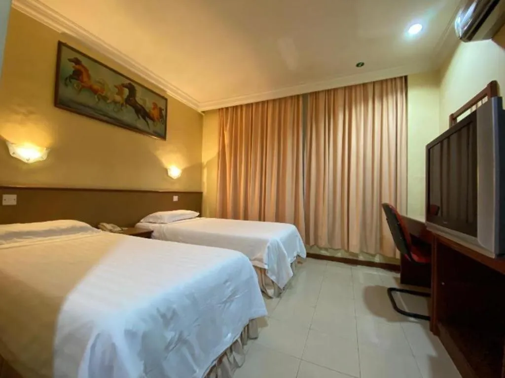 Bed in OYO 89958 Hotel Umimas