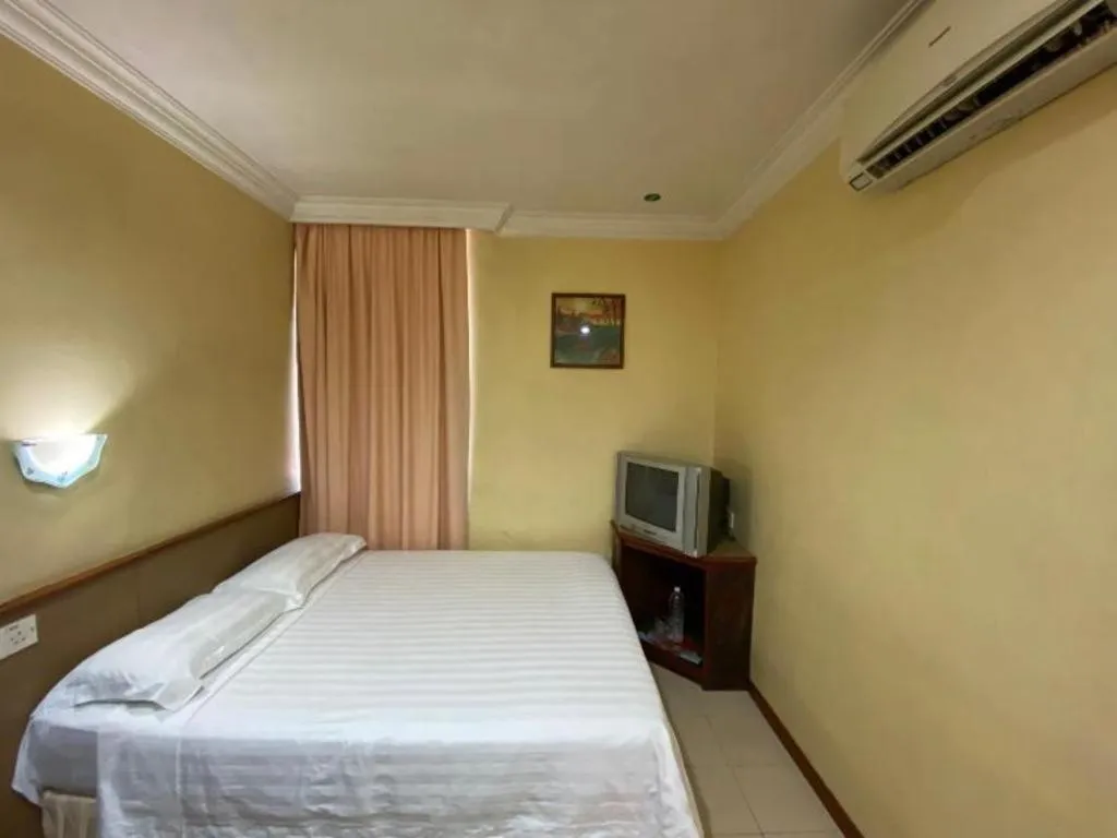 Bed in OYO 89958 Hotel Umimas