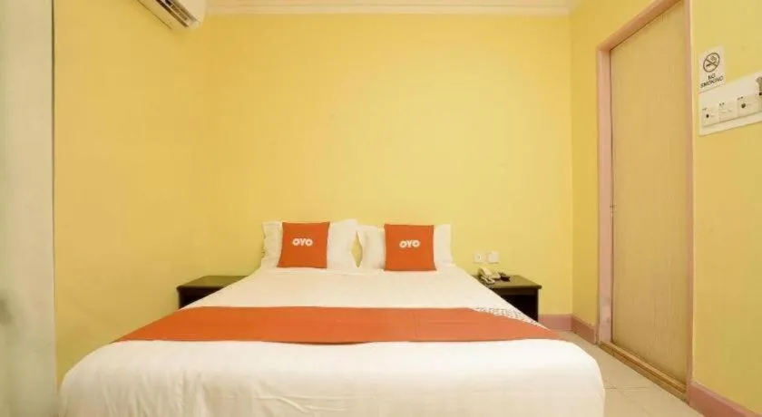 Bed in OYO 89958 Hotel Umimas