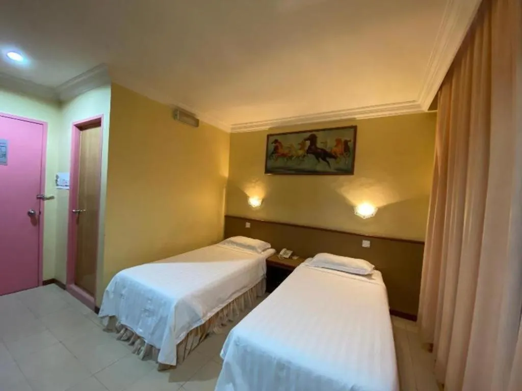 Bed in OYO 89958 Hotel Umimas