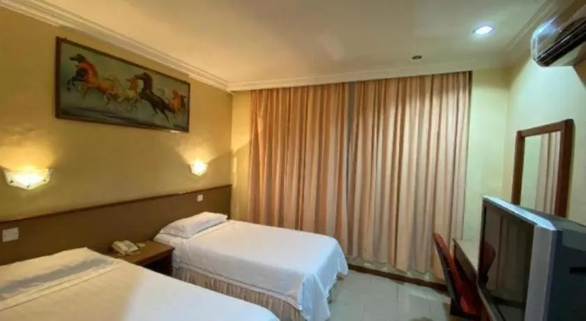 Bed in OYO 89958 Hotel Umimas