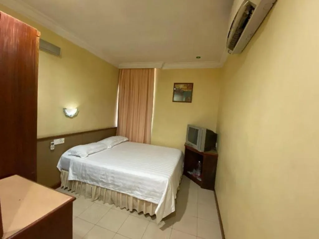 Bed in OYO 89958 Hotel Umimas