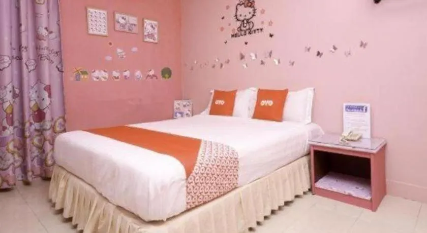 Bed in OYO 89958 Hotel Umimas