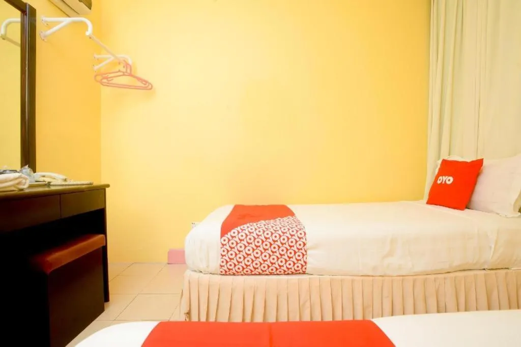 Bed in OYO 89958 Hotel Umimas