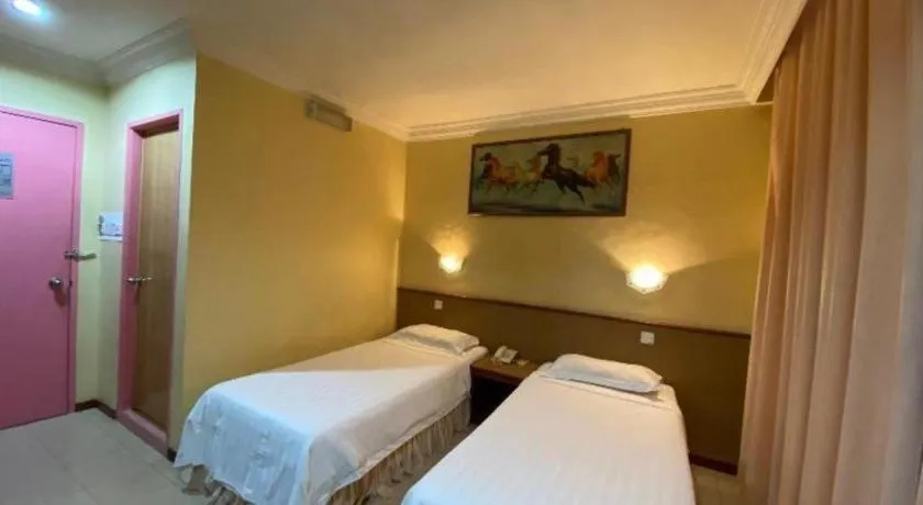 Bed in OYO 89958 Hotel Umimas