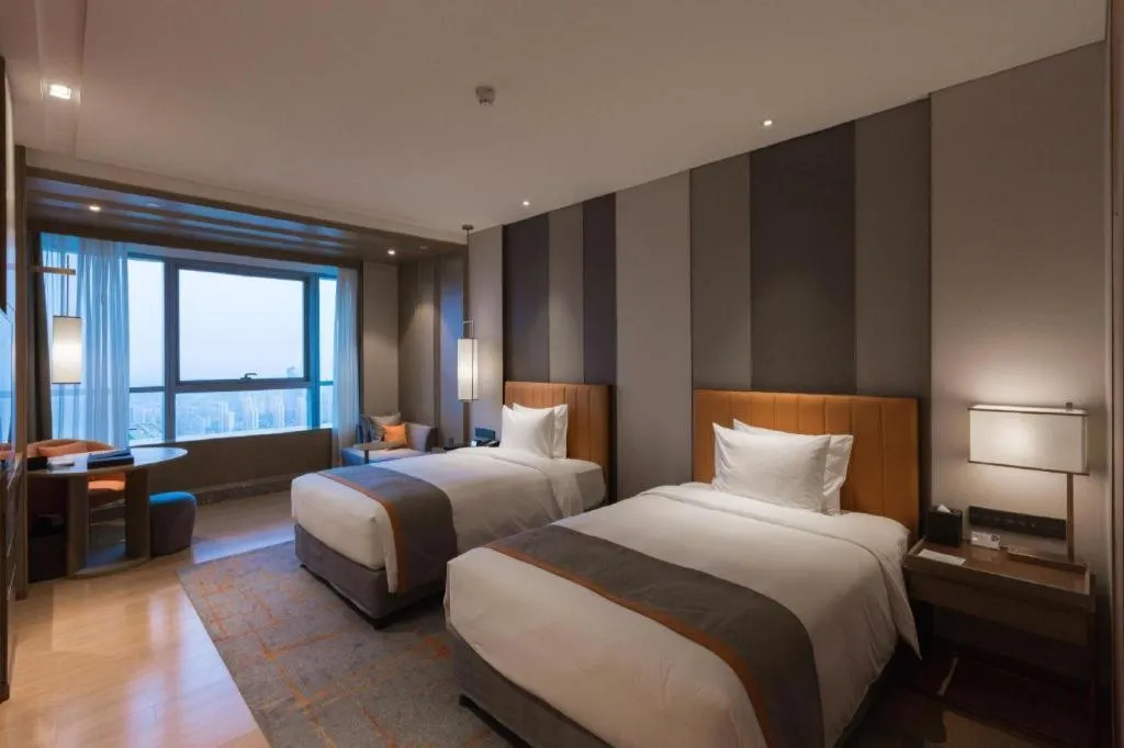 Bed in Hui Feng Wan Yun Hotel Hefei