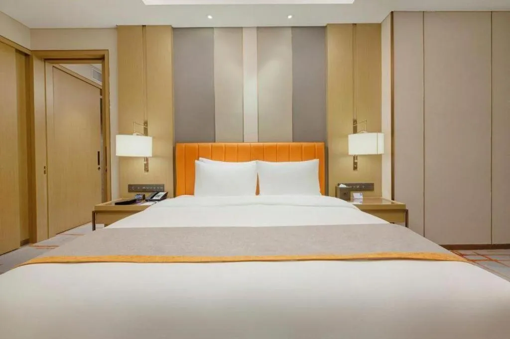 Bed in Hui Feng Wan Yun Hotel Hefei