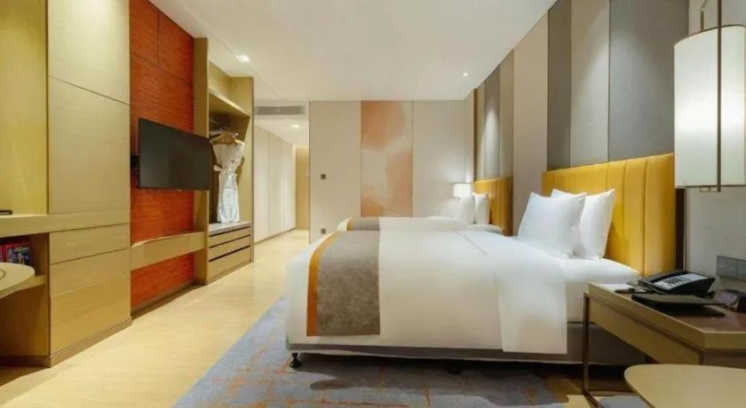 Bed in Hui Feng Wan Yun Hotel Hefei