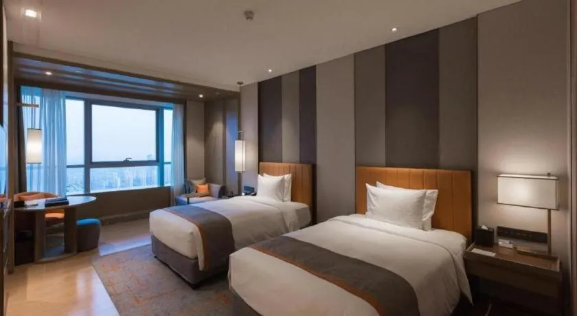 Bed in Hui Feng Wan Yun Hotel Hefei