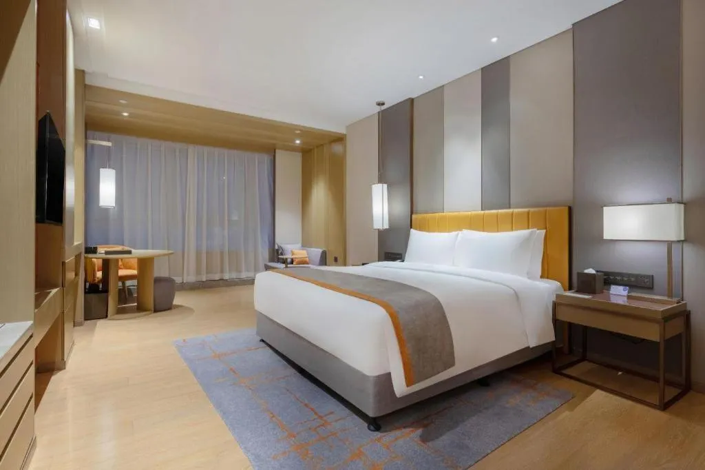 Bed in Hui Feng Wan Yun Hotel Hefei