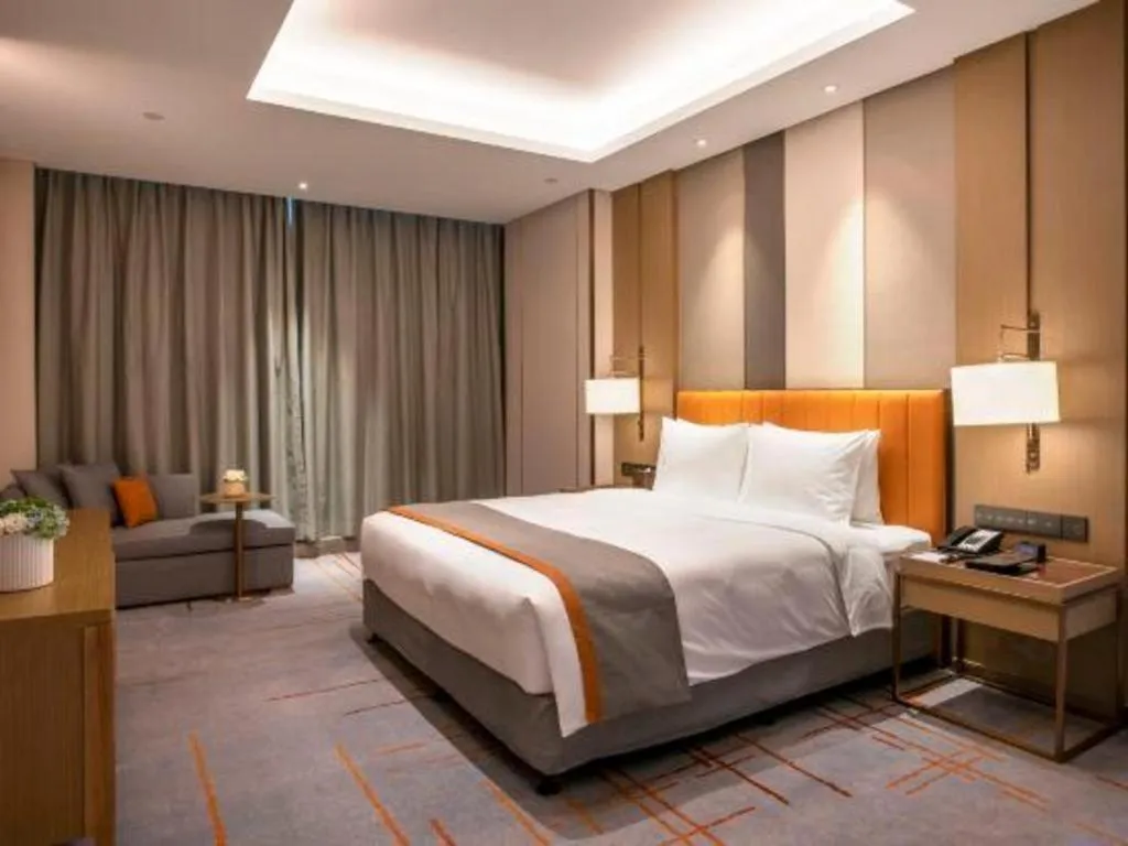 Bed in Hui Feng Wan Yun Hotel Hefei