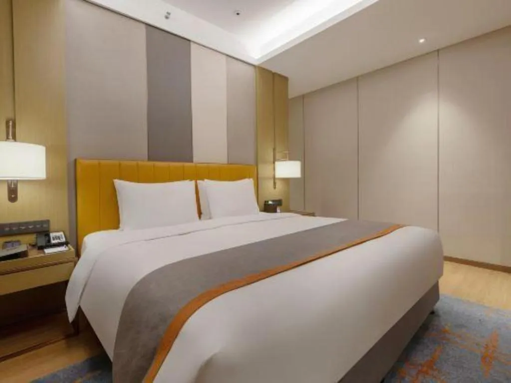 Bed in Hui Feng Wan Yun Hotel Hefei