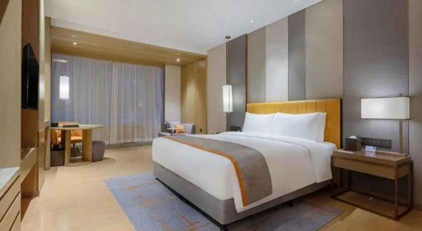 Bed in Hui Feng Wan Yun Hotel Hefei