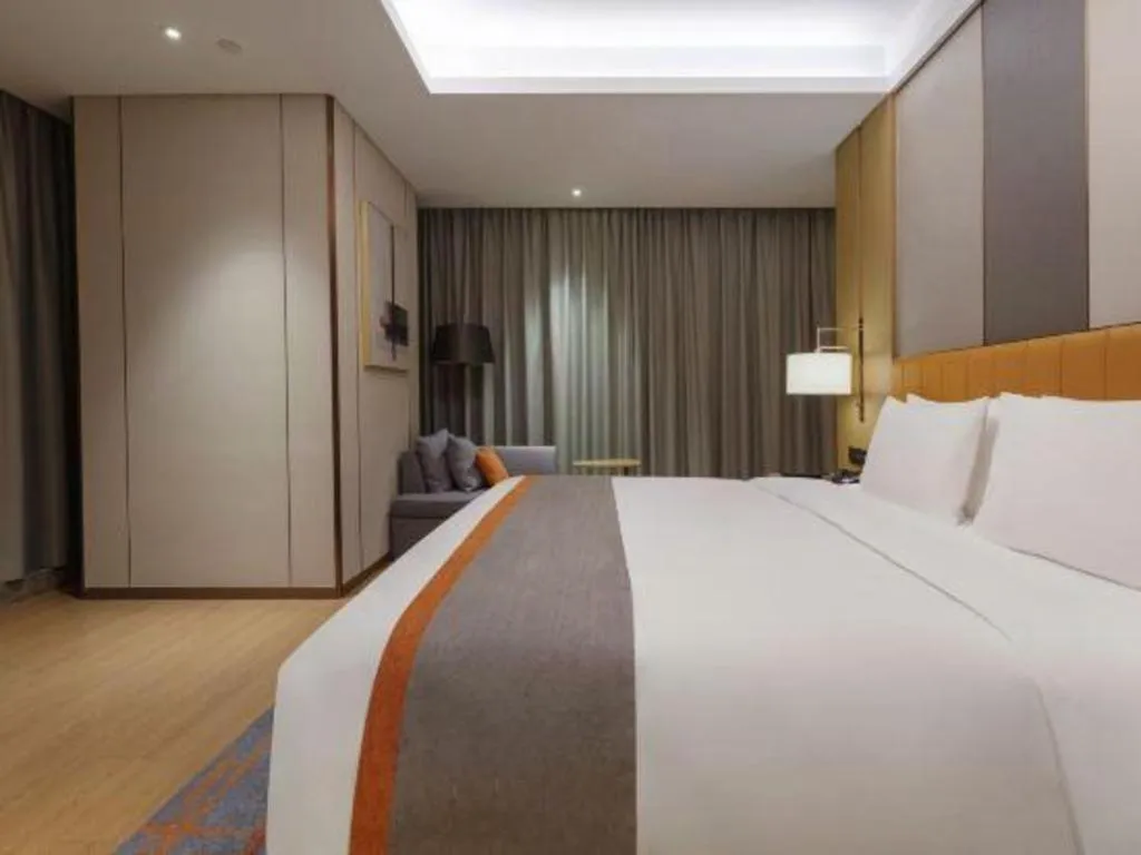 Bed in Hui Feng Wan Yun Hotel Hefei