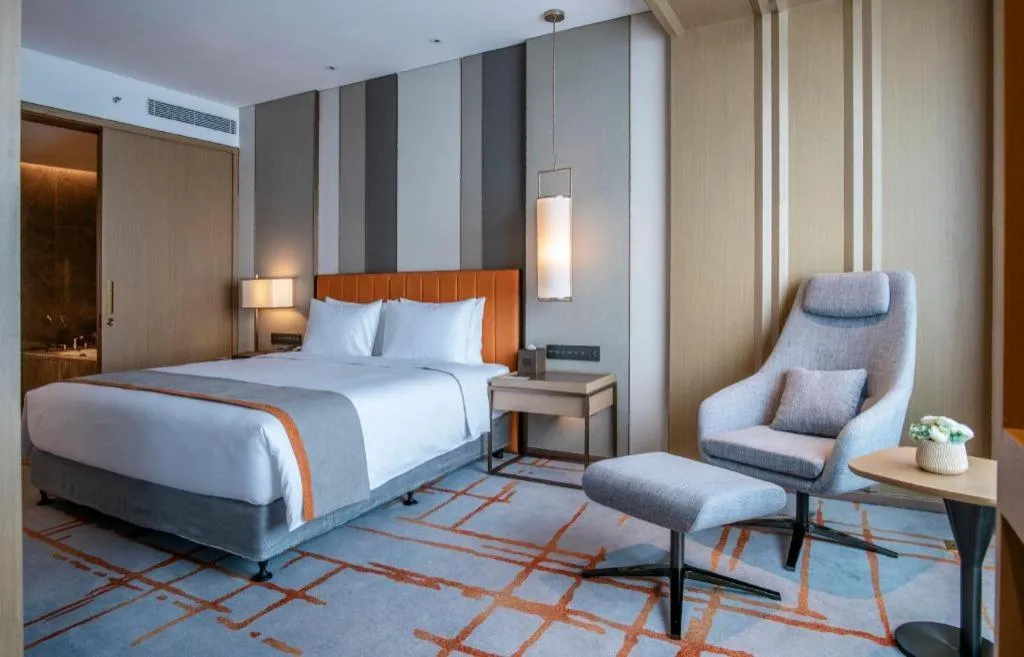 Bed in Hui Feng Wan Yun Hotel Hefei