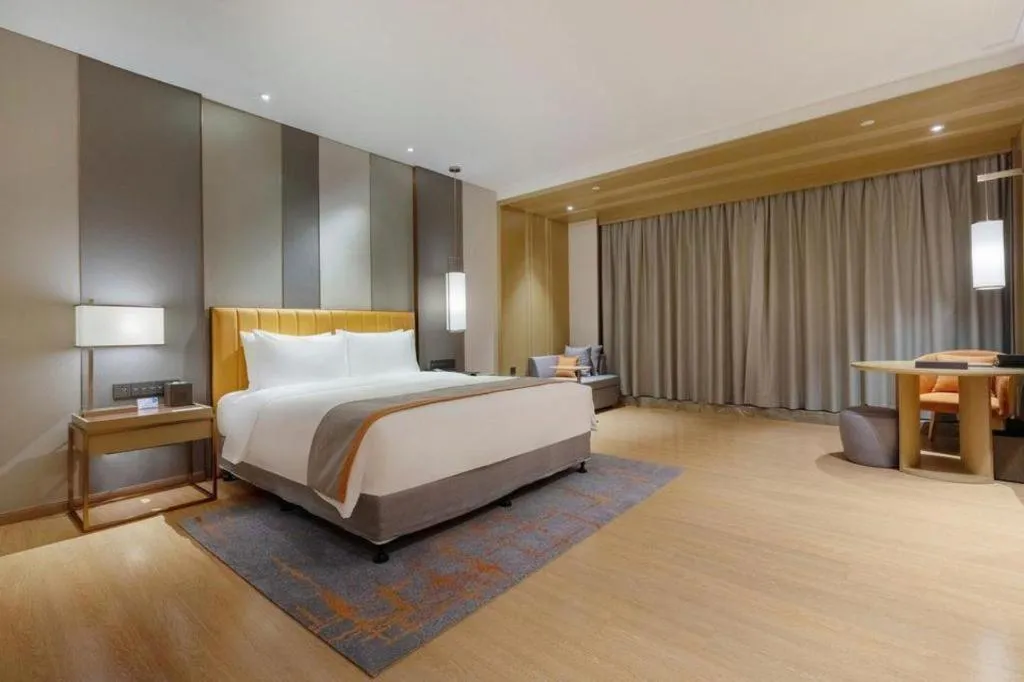 Bed in Hui Feng Wan Yun Hotel Hefei