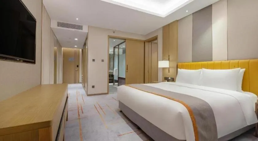 Bed in Hui Feng Wan Yun Hotel Hefei