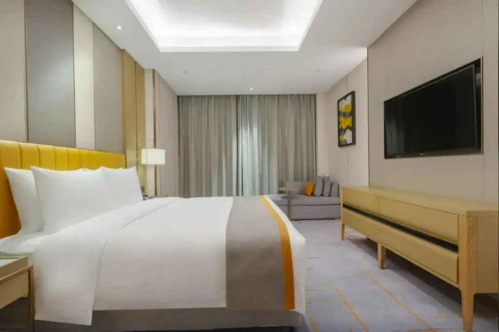 Bed in Hui Feng Wan Yun Hotel Hefei