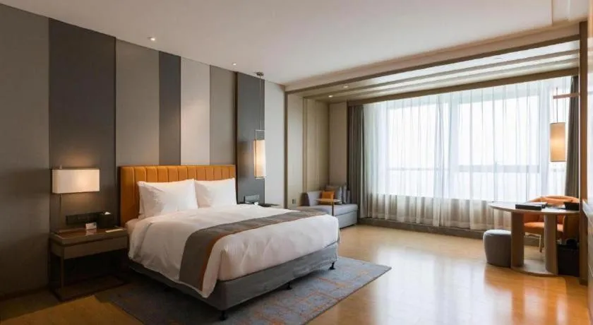 Bed in Hui Feng Wan Yun Hotel Hefei