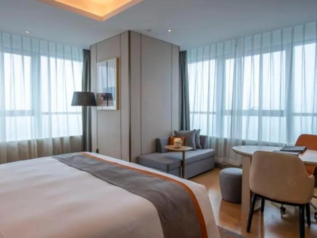 Bed in Hui Feng Wan Yun Hotel Hefei